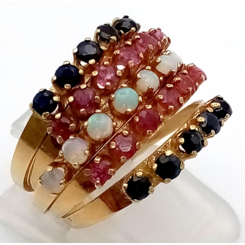 227 - A very unusual 14 K yellow gold five band hinged ring  with opals, rubies and sapphires. Ring size: ... 