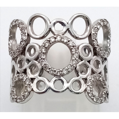 255 - A 9 K white gold fancy diamond ring. Ring size: N, weight: 4.8 g.