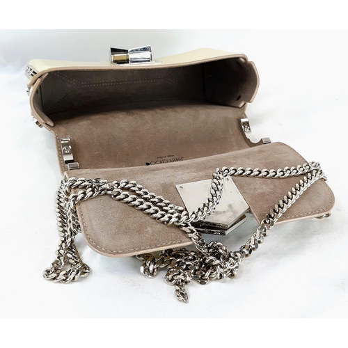 271 - A Jimmy Choo Lockett Leather Shoulder Bag. Calfskin leather with a suede lining. Silver-tone studs w... 