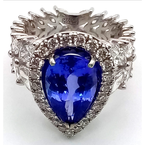 32 - 14K WHITE GOLD DIAMOND & TANZANITE RING, WITH 5CT DIAMONDS APPROX & 3CT TANZANITE CENTRE STONE,
WEIG... 