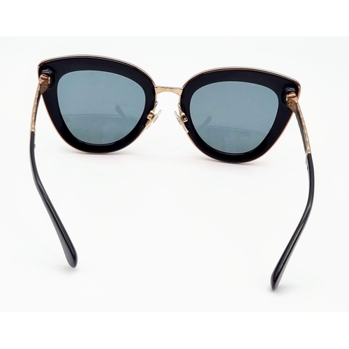 384 - A Pair of Chanel Gilded Sunglasses - Comes in original Chanel case. Ref: 9803