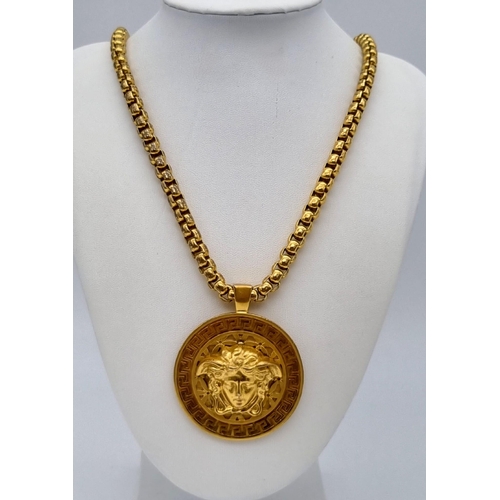 438 - A Gold Plated Versace Statement Necklace and Pendant.
Comes in original Versace presentation case. 6... 