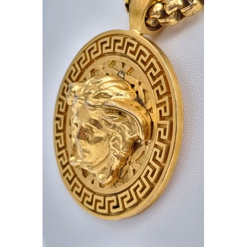 438 - A Gold Plated Versace Statement Necklace and Pendant.
Comes in original Versace presentation case. 6... 