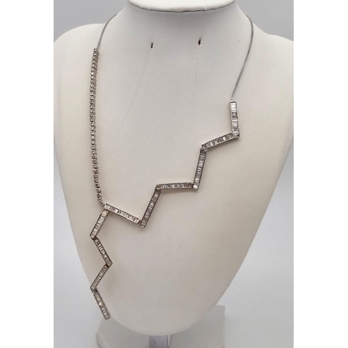 85 - A Unique 18K White Gold Diamond Zig-Zag Necklace. On one side 36 quality small round cut diamonds - ... 