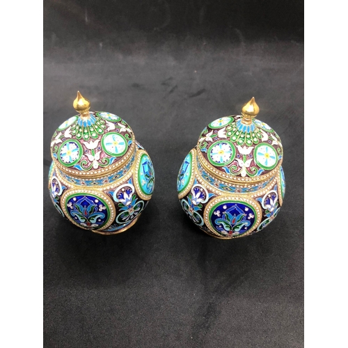 554 - A PAIR of Russian silver enamel lidded urn/caddys Height 10.6cm Diameter 6.6cm Weight 295 for the pa... 