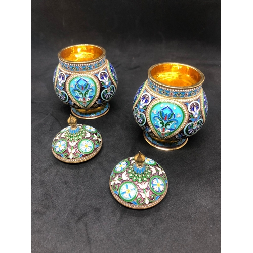 554 - A PAIR of Russian silver enamel lidded urn/caddys Height 10.6cm Diameter 6.6cm Weight 295 for the pa... 