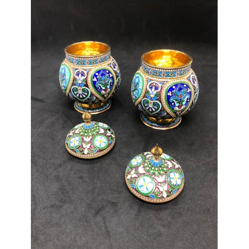 554 - A PAIR of Russian silver enamel lidded urn/caddys Height 10.6cm Diameter 6.6cm Weight 295 for the pa... 