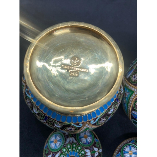 554 - A PAIR of Russian silver enamel lidded urn/caddys Height 10.6cm Diameter 6.6cm Weight 295 for the pa... 