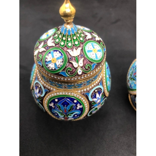 554 - A PAIR of Russian silver enamel lidded urn/caddys Height 10.6cm Diameter 6.6cm Weight 295 for the pa... 