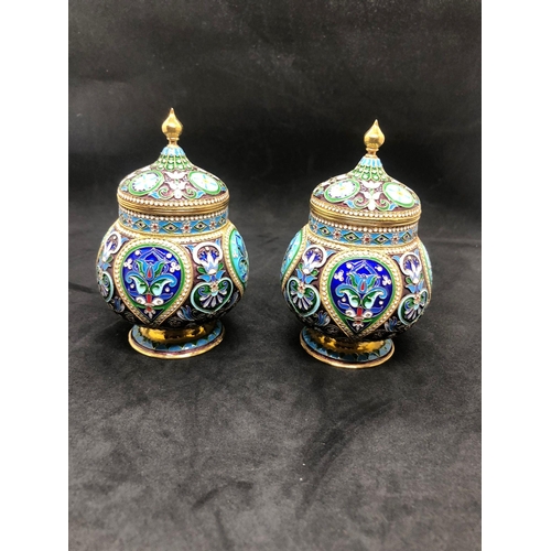 554 - A PAIR of Russian silver enamel lidded urn/caddys Height 10.6cm Diameter 6.6cm Weight 295 for the pa... 