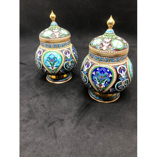 554 - A PAIR of Russian silver enamel lidded urn/caddys Height 10.6cm Diameter 6.6cm Weight 295 for the pa... 