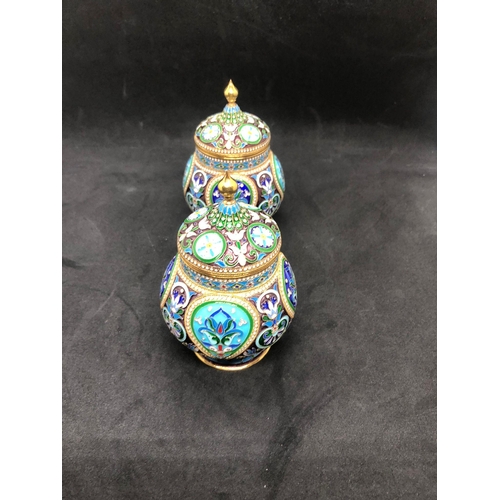 554 - A PAIR of Russian silver enamel lidded urn/caddys Height 10.6cm Diameter 6.6cm Weight 295 for the pa... 