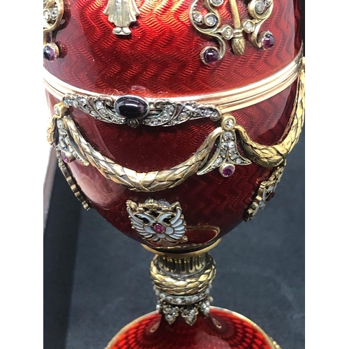 65 - MAGNIFICENT RUSSIAN 14k SOLID GOLD AND SILVER ENAMAL SURPRISE DIAMOND EGG.

Stunning 14k gold and si... 