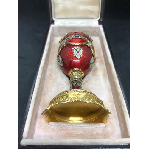 65 - MAGNIFICENT RUSSIAN 14k SOLID GOLD AND SILVER ENAMAL SURPRISE DIAMOND EGG.

Stunning 14k gold and si... 