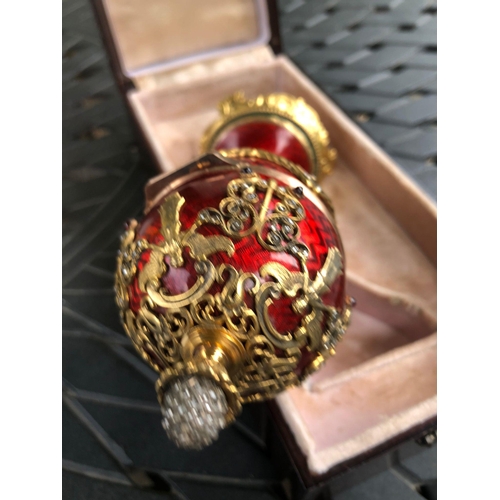 65 - MAGNIFICENT RUSSIAN 14k SOLID GOLD AND SILVER ENAMAL SURPRISE DIAMOND EGG.

Stunning 14k gold and si... 