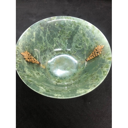 79 - STUNNING RUSSIAN SOLID SILVER SPINACH JADE DIAMOND BOWL.

Stunning bowl with bulls heads either side... 