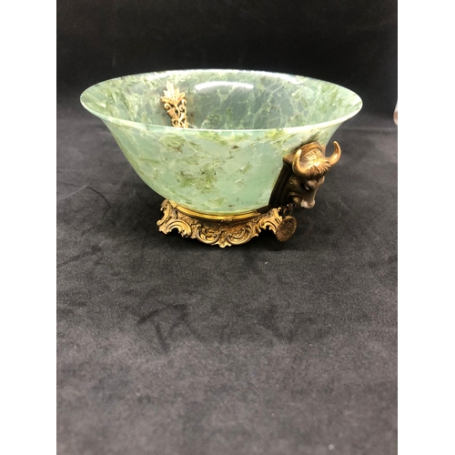 79 - STUNNING RUSSIAN SOLID SILVER SPINACH JADE DIAMOND BOWL.

Stunning bowl with bulls heads either side... 