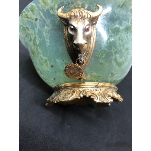 79 - STUNNING RUSSIAN SOLID SILVER SPINACH JADE DIAMOND BOWL.

Stunning bowl with bulls heads either side... 