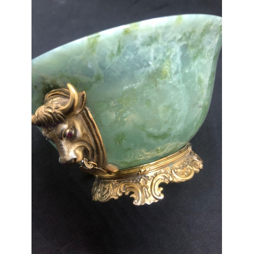 79 - STUNNING RUSSIAN SOLID SILVER SPINACH JADE DIAMOND BOWL.

Stunning bowl with bulls heads either side... 