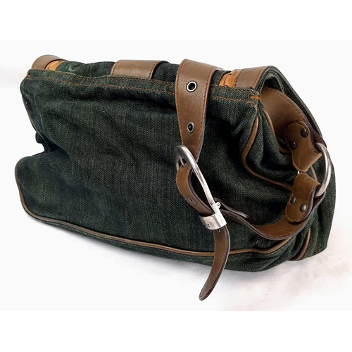 424 - A Christian Dior Green Gaucho Double Saddle Bag. Green denim with leather. 24 x 30cm. In very good c... 