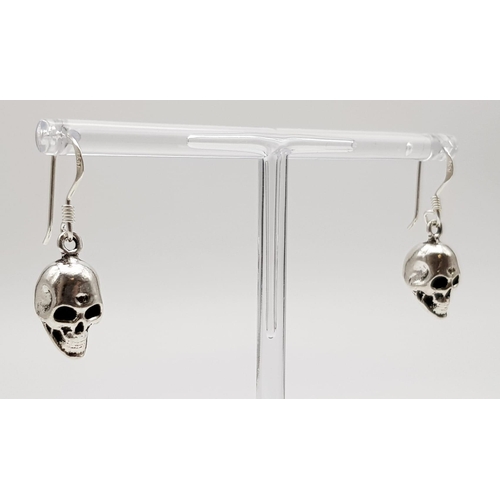 535 - A Pair of Silver Skull Drop Earrings. Perfect for Halloween.