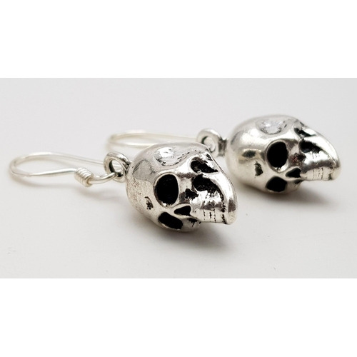 535 - A Pair of Silver Skull Drop Earrings. Perfect for Halloween.