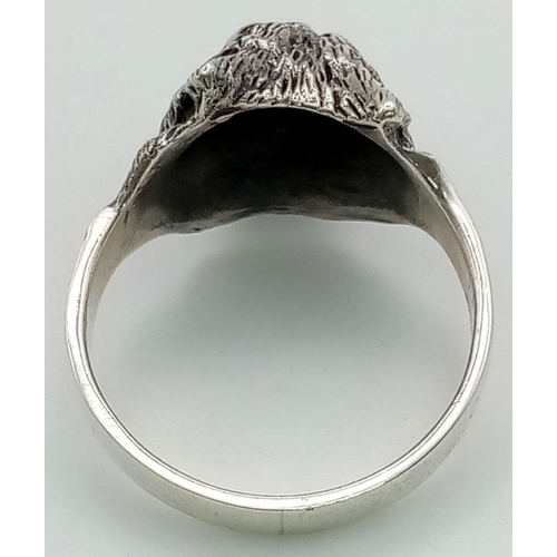 576 - A Solid Silver Wolfs Head Gents Ring. Size Z. 8.84g