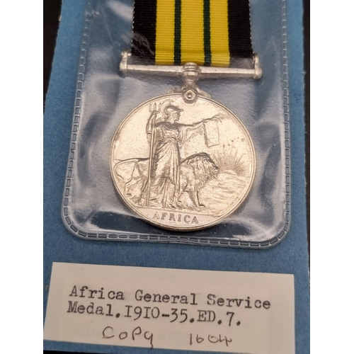 811 - A Collection of 4 Vintage Retrospective Copies of Military Medals. Comprising; Africa General Servic... 