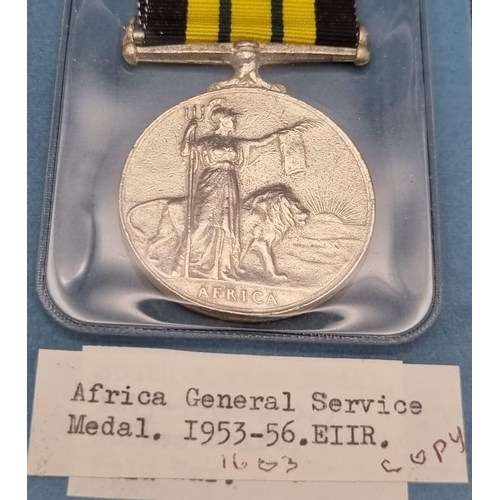 811 - A Collection of 4 Vintage Retrospective Copies of Military Medals. Comprising; Africa General Servic... 