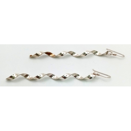 832 - A Pair of Sterling Silver 8cm Length Spiral Dangle Earrings 4.27 grams.