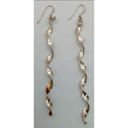 832 - A Pair of Sterling Silver 8cm Length Spiral Dangle Earrings 4.27 grams.