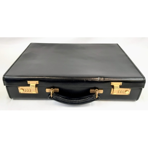 761 - A Simpson of London Black Leather Attaché Case. Unused but some small signs of shop wear and tear. 1... 