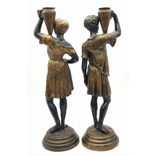 632 - An antique pair of 19th century Louis Hottot blackamoor bronze candlesticks. 36 and 37cm tall. Total... 