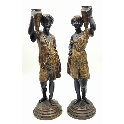 632 - An antique pair of 19th century Louis Hottot blackamoor bronze candlesticks. 36 and 37cm tall. Total... 