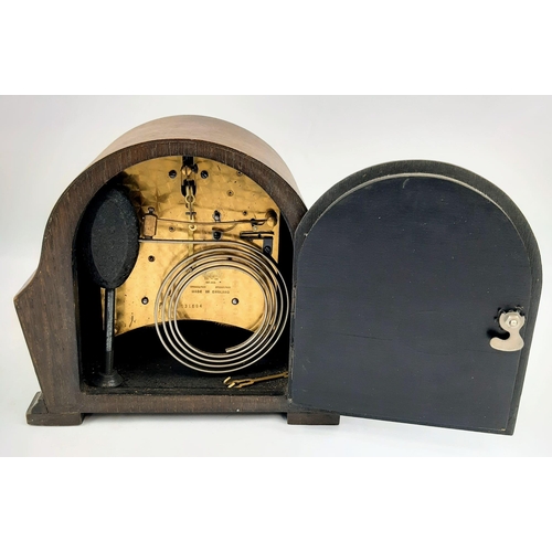 961 - An Antique Garrard Wooden Mantle Clock. Comes with original key. Not presently working so A/F. 19 x ... 