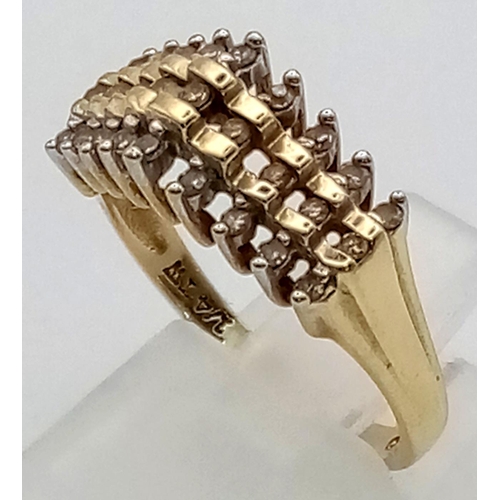 316 - An unusual 10 K yellow gold ring with three diamond rows (0.20 carats). Ring size: N, weight: 3 g.