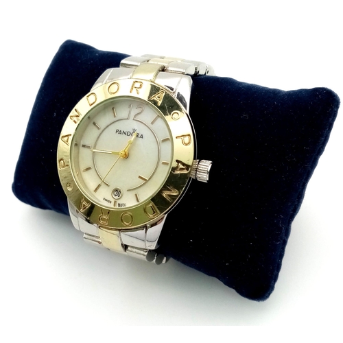 513 - A PANDORA stainless steel watch. Case width: 36 mm, mother of pearl dial with date window. In full w... 