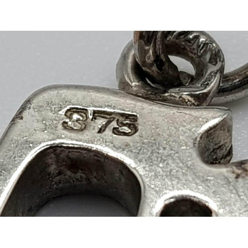 213 - A 9 K white gold Chai symbol pendant/charm, weight: 1.2 g.