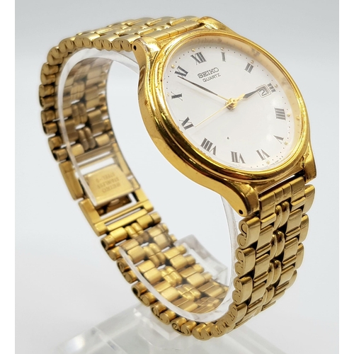 223 - A yellow gold plated SEIKO gents watch. Case width: 33 mm, white dial with black Roman numerals and ... 