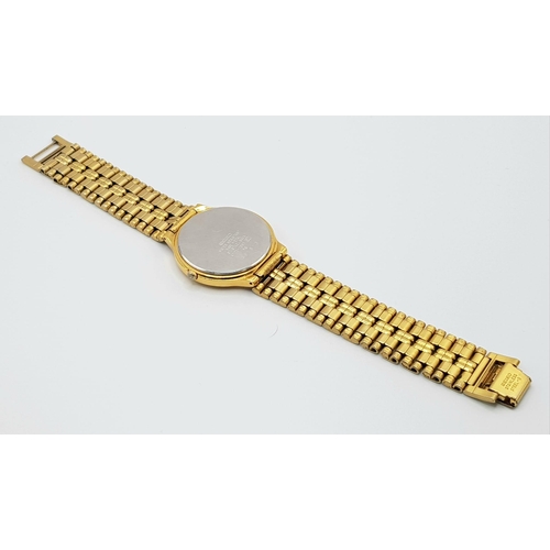 223 - A yellow gold plated SEIKO gents watch. Case width: 33 mm, white dial with black Roman numerals and ... 