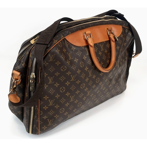 265 - A Louis Vuitton Monogram Alize 24Hr Boston Bag. Shoulder strap. Brown leather handles. Cloth interio... 