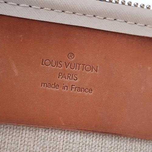 265 - A Louis Vuitton Monogram Alize 24Hr Boston Bag. Shoulder strap. Brown leather handles. Cloth interio... 