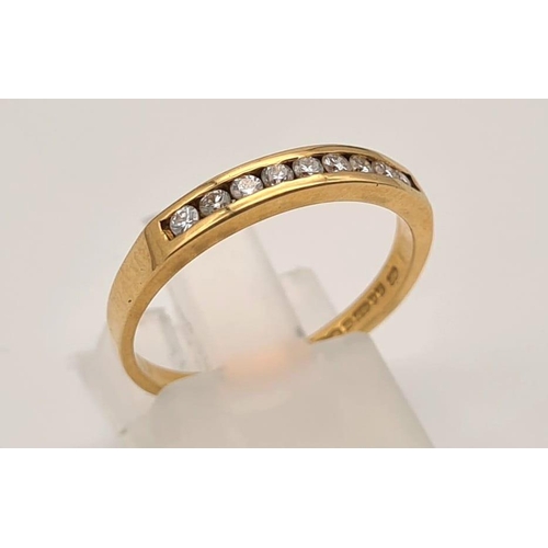 295 - An 18 K yellow gold CHANNEL ring with a band of 9 diamonds (0.25 carats). Ring size: O, weight: 2.5 ... 