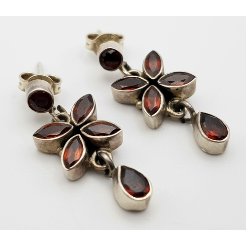 318 - Sterling Silver Garnet Set Drop Earrings. weight: 7.3g. Length:25mm