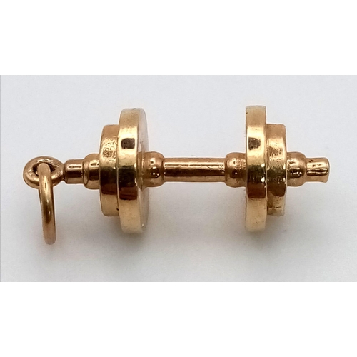 460 - An unusual, 9 K yellow gold dumbbell charm. length: 23 mm, weight: 4.7 g.