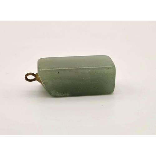 474 - A rectangular shaped jade pendant. Drop: 20 mm.