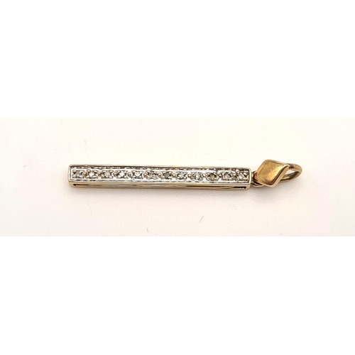 536 - A 9 K yellow gold diamond pendant with a back section that comes out with the inscription: I LOVE YO... 