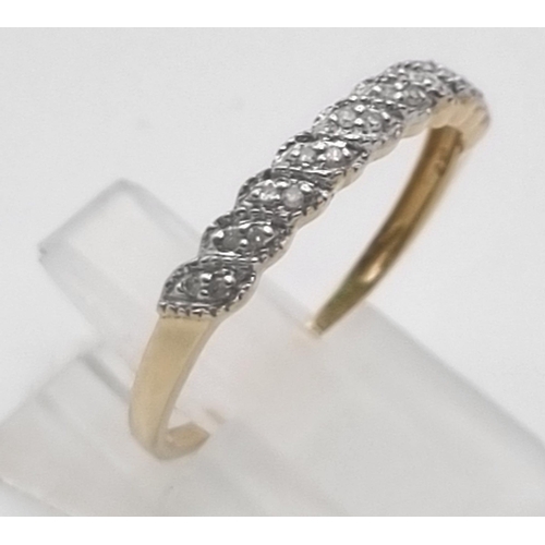 775 - 9K YELLOW GOLD DIAMOND BAND RING 1.5G 0.10CT SIZE R.