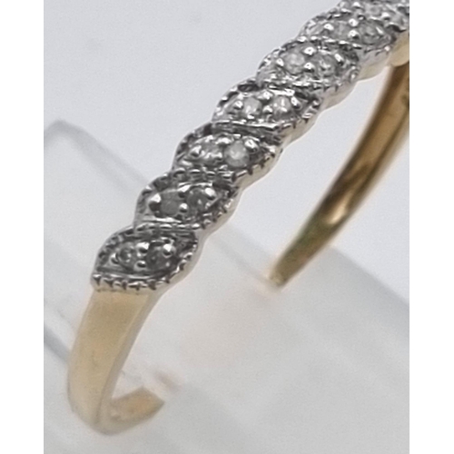 775 - 9K YELLOW GOLD DIAMOND BAND RING 1.5G 0.10CT SIZE R.