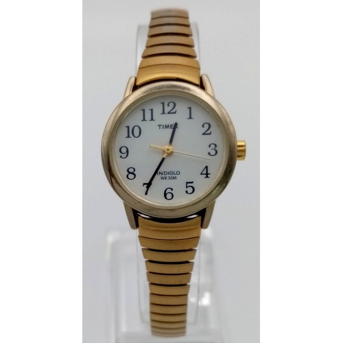 473 - A Timex Indiglo Ladies Watch with Expandable Strap. Case - 22mm. Quartz movement, needs a battery so... 